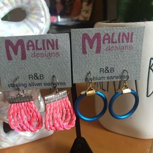 Two fierce pairs of earrings